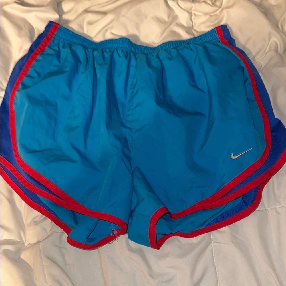 Nike Blue and Red Athletic Shorts with Curved Hem